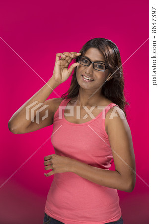 Portrait of stylish Indian Woman wearing glasses. 8637397