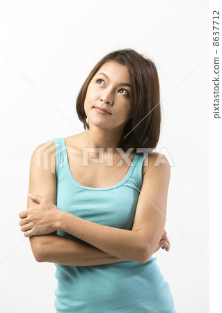 Thoughtful Asian woman looking up. 8637712