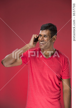 Portrait of Indian man on phone. Portrait of Indian man on phone. 8637788