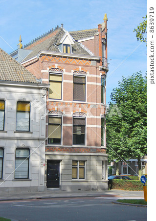 Facade of a beautiful building in the Dutch city Dordrecht, Ne Facade of a beautiful building in the Dutch city Dordrecht, Ne 8639719