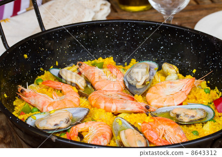 Paella close up -traditional spanish dish Paella close up -traditional spanish dish 8643312