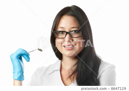 brunette young smiling female dentist isolated on white background brunette young smiling female dentist isolated on white background 8647129