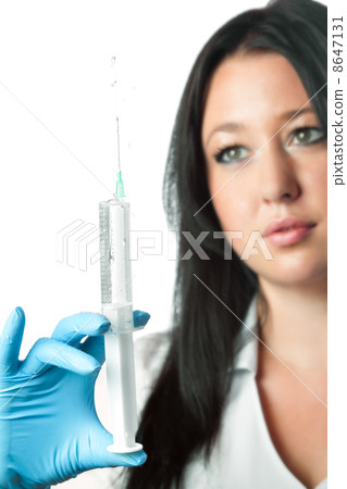 young attractive nurse holding syringe isolated on white background 8647131