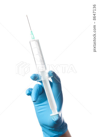 hand in blue glove holding syringe isolated on white background hand in blue glove holding syringe isolated on white background 8647136