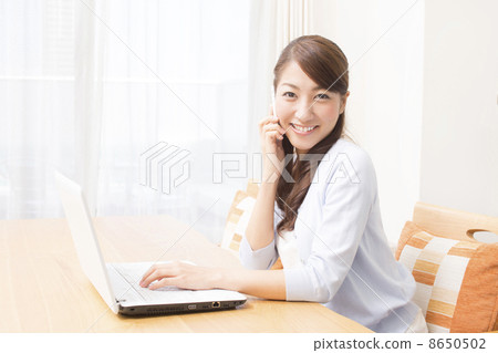 Housewife to call while making a computer Housewife to call while making a computer 8650502