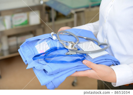 Female doctor with scrub 8651034