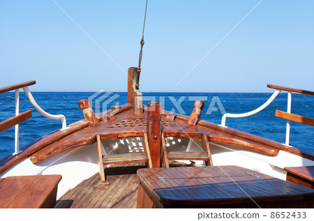 The bow of old wood ship 8652433