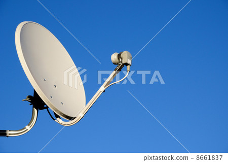 Satellite TV antenna on blue sky background 8661837