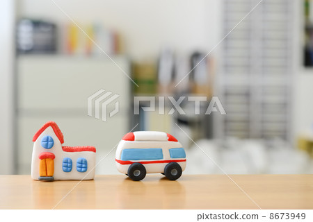 Ambulance and house 8673949