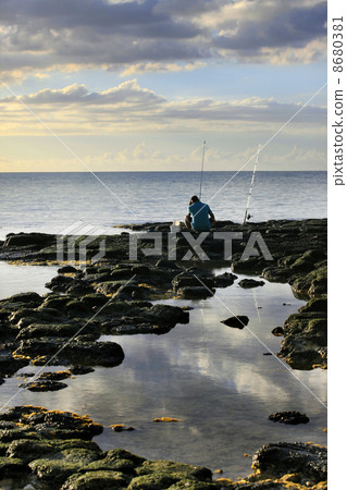 The fisherman at coast The fisherman at coast 8680381