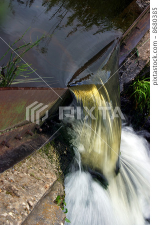 Waterfall in a forest Waterfall in a forest 8680385