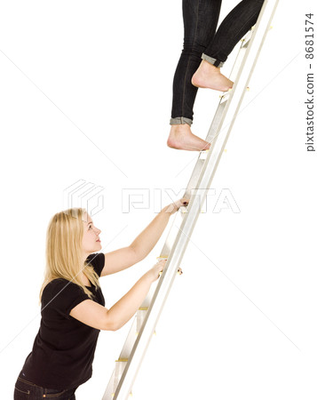 Women climbing up the ladder Women climbing up the ladder 8681574