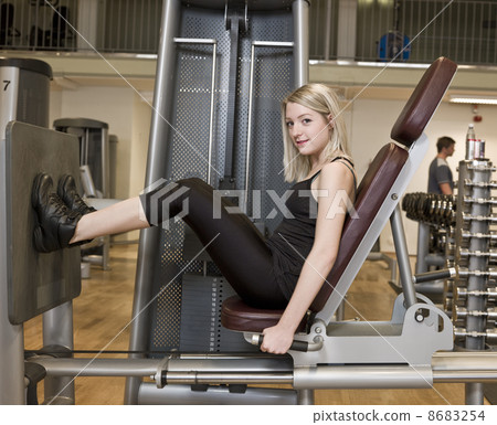 Girl exercing her legs 8683254