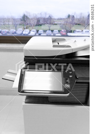 big grey copier in grey office 8686281
