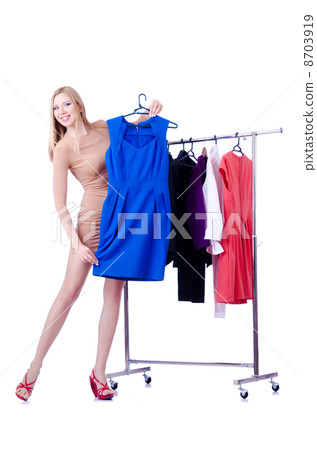 Woman trying new clothing on white 8703919