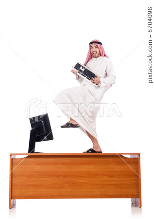 Arab man sitting at his desk Arab man sitting at his desk 8704098