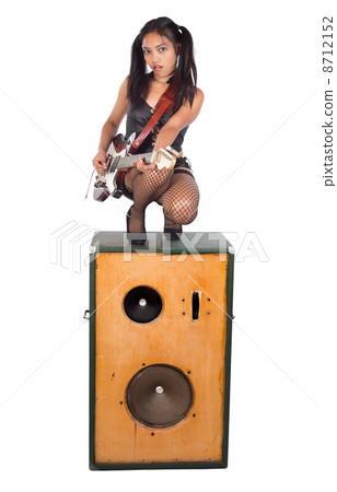 rock musician with a large speaker 8712152