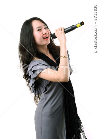 Karaoke girl singing on the white background 8713830