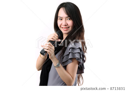 Karaoke girl singing on the white background 8713831