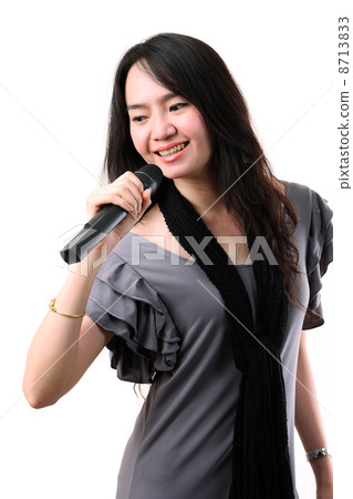 Karaoke girl singing on the white background 8713833