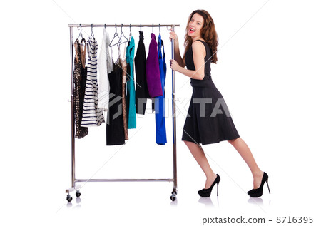 Woman trying new clothing on white 8716395