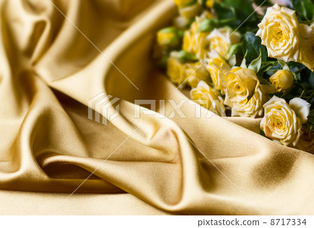 Yellow roses on silk background Yellow roses on silk background 8717334
