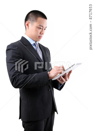business man holding a digital touch screen tablet computer 8717653