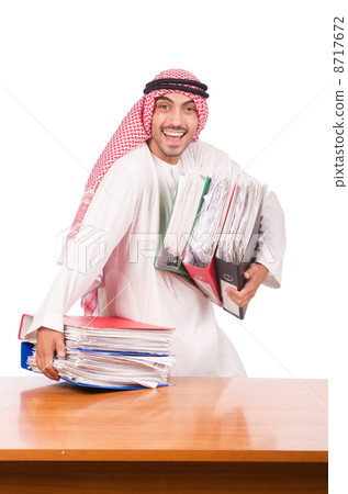 Arab businessman with many folders on white Arab businessman with many folders on white 8717672