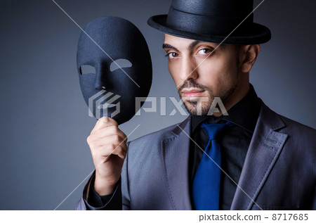 Man with black mask in studio 8717685