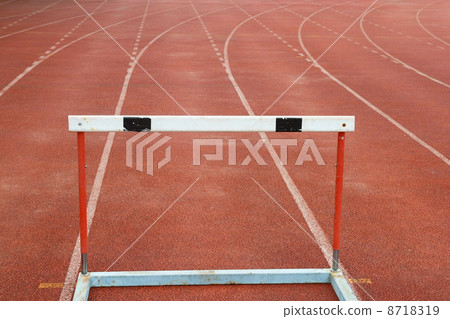 a hurdles on red running tracks 8718319