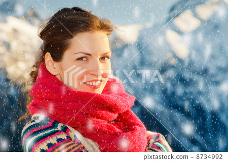 Attractive girl in snowy winter Alps 8734992