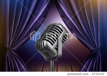 stage with open curtains and microphone 8735347