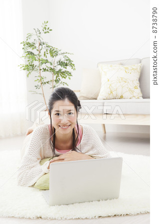 A woman relaxing in the room A woman relaxing in the room 8738790