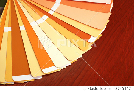 open pantone sample colors catalogue on wood background open pantone sample colors catalogue on wood background 8745142
