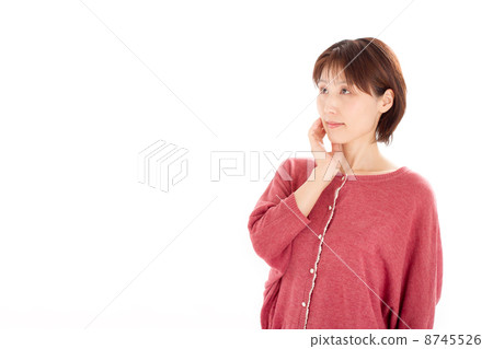 Middle women looking up diagonally with cuffs on hand Middle women looking up diagonally with cuffs on hand 8745526