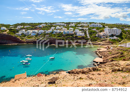 Cala Morell cove scenery in sunny day at Menorca, Spain. 8754912