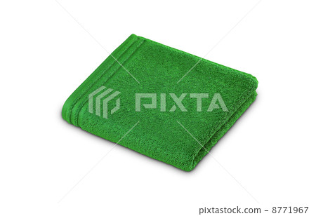 Green rolled up towel over white background 8771967