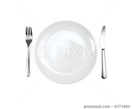 Close up of a diner plate with fork and spoon 8771983