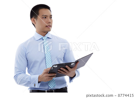 Asian business man using digital tablet computer 8774415