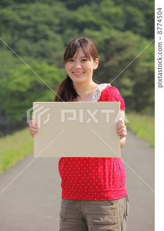 A woman in fresh green A woman in fresh green 8774504