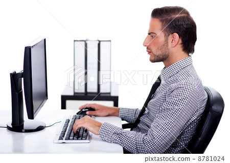 Business man verfying data on his computer 8781024