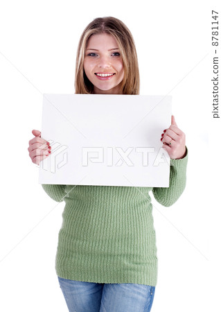 Smiling young beautiful girl holding blank white board Smiling young beautiful girl holding blank white board 8781147