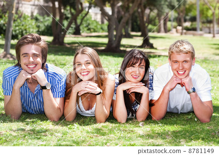 Four teens with hands on their chin 8781149
