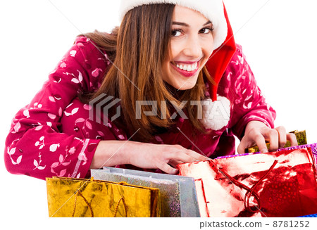lady opening christmas gifts 8781252