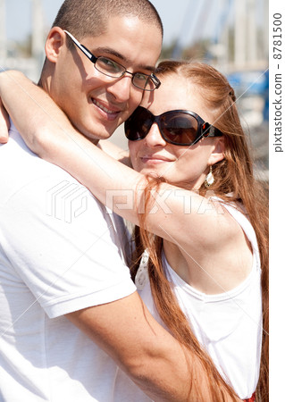 Close up portrait of a happy couple hugging Close up portrait of a happy couple hugging 8781500