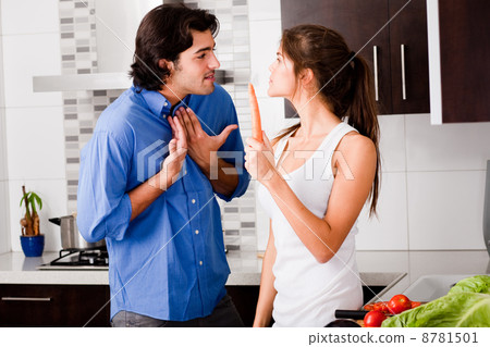 young couple argue themself in the kitchen young couple argue themself in the kitchen 8781501