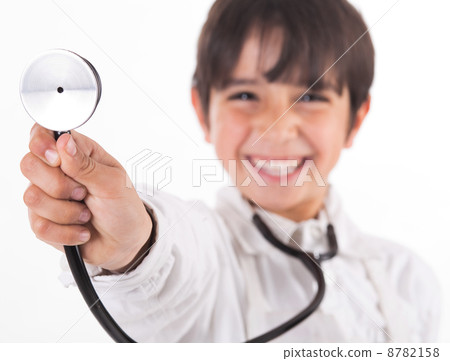 Little doctor showing his Stethoscope Little doctor showing his Stethoscope 8782158