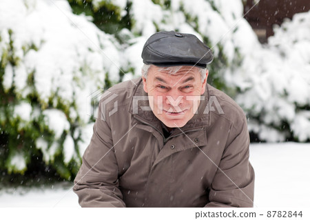 Portrait of senior man on winter day 8782844