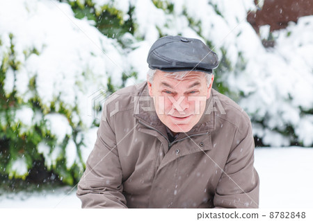 Portrait of senior man on winter day 8782848
