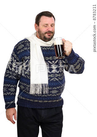 Man in a white scarf  with dark beer mug 8783211